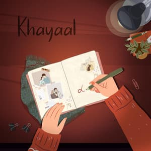 Cover art for “Khayaal”: an illustration of a hand writing in an open journal with photos tucked inside, on a deep red desk.