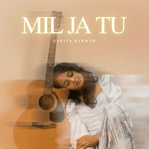 Cover art for “Mil Ja Tu” by Ankita Barwad: a soft, blurred portrait of Ankita resting with her eyes closed beside an acoustic guitar, title in glowing white capitals.